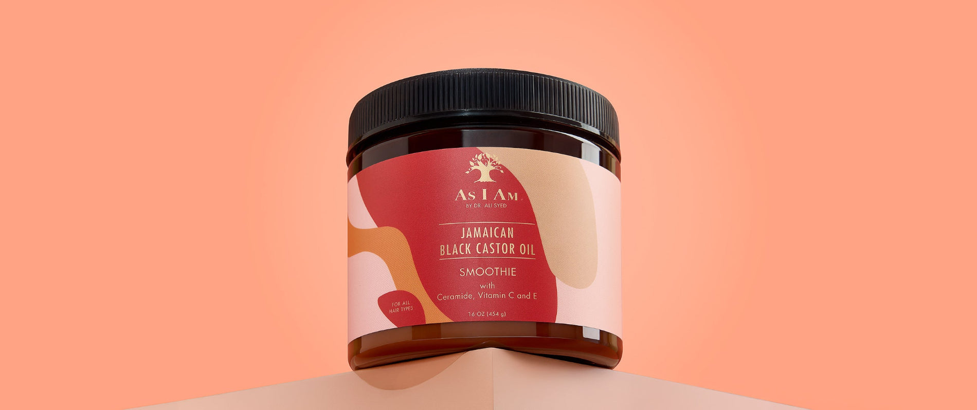 As I Am x Showy Jamaican Black Castor Oil Smoothie - photo du paysage de la riche crème coiffante conçue pour définir les boucles, réduire les frisottis et nourrir les cheveux avec l'hydratation infusée de JBCO.