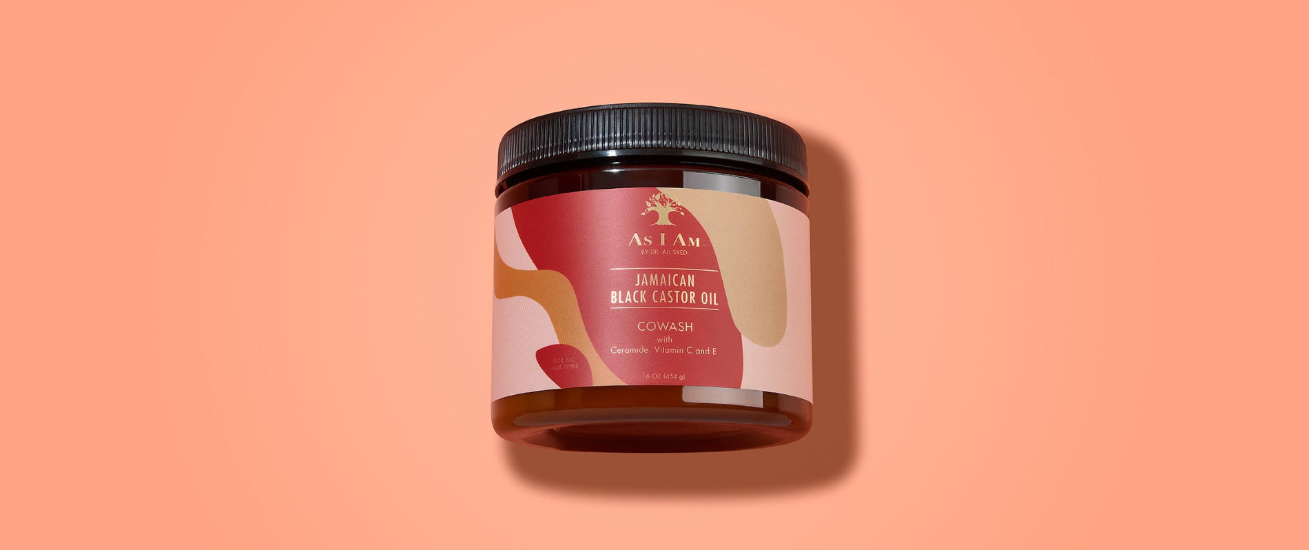 As I Am Jamaican Black Castor Oil CoWash - photo de paysage de l'après-shampoing nettoyant conçu pour éliminer en douceur les accumulations tout en hydratant et en renforçant les boucles grâce au JBCO.