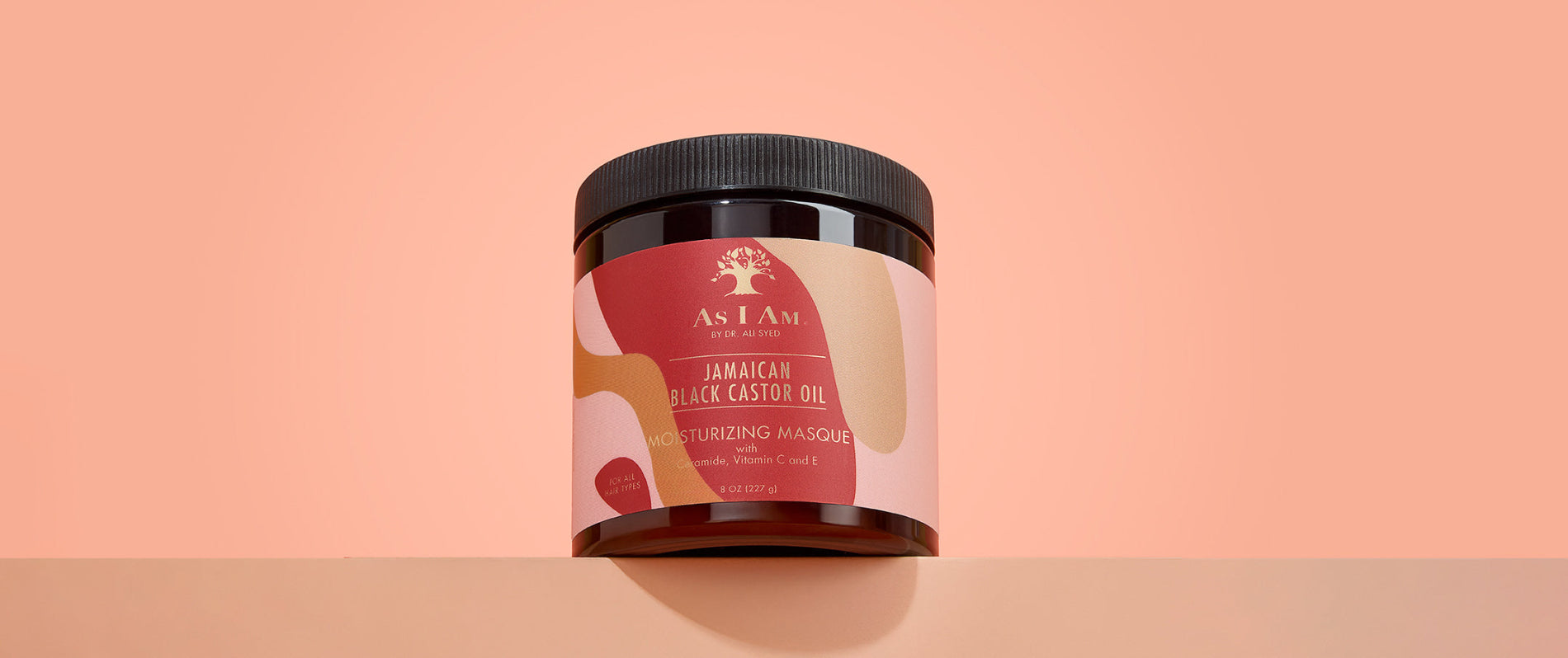 As I Am Jamaican Black Castor Oil Hair Mask - image de paysage du traitement revitalisant en profondeur conçu pour renforcer, hydrater et réparer les boucles abîmées grâce à l'huile de ricin noire jamaïcaine riche en nutriments.