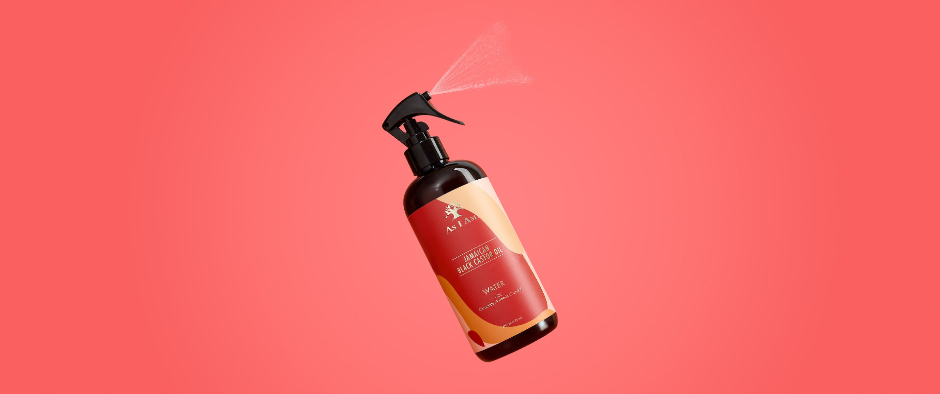 As I Am Jamaican Black Castor Oil Water - photo de paysage du spray léger sans rinçage infusé de JBCO, formulé pour hydrater, démêler et revitaliser les boucles naturelles.