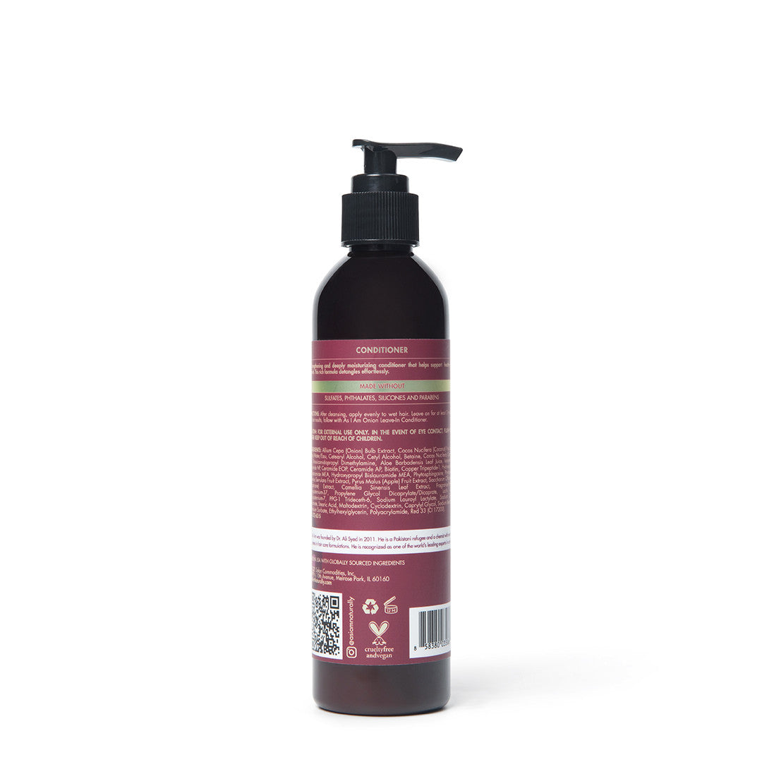 Bouteille de revitalisant avec pompe sur fond blanc