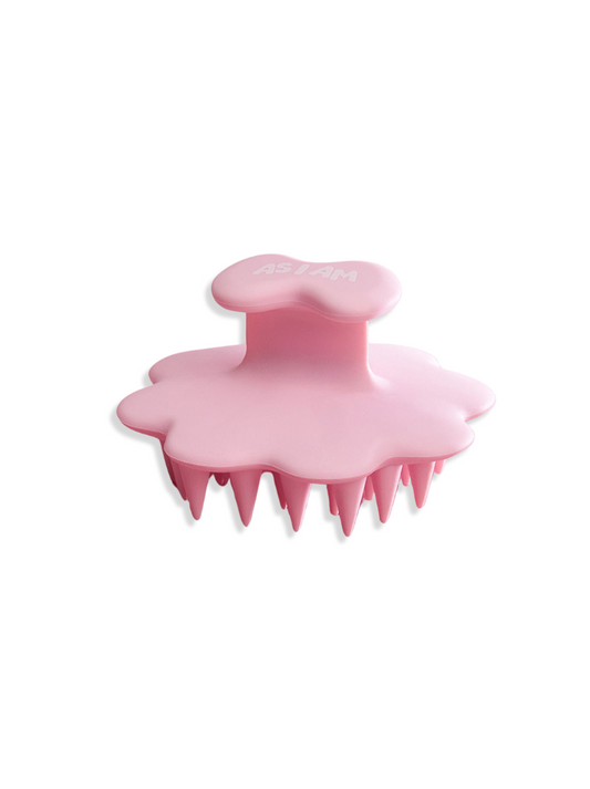 Brosse à cheveux rose sur fond blanc