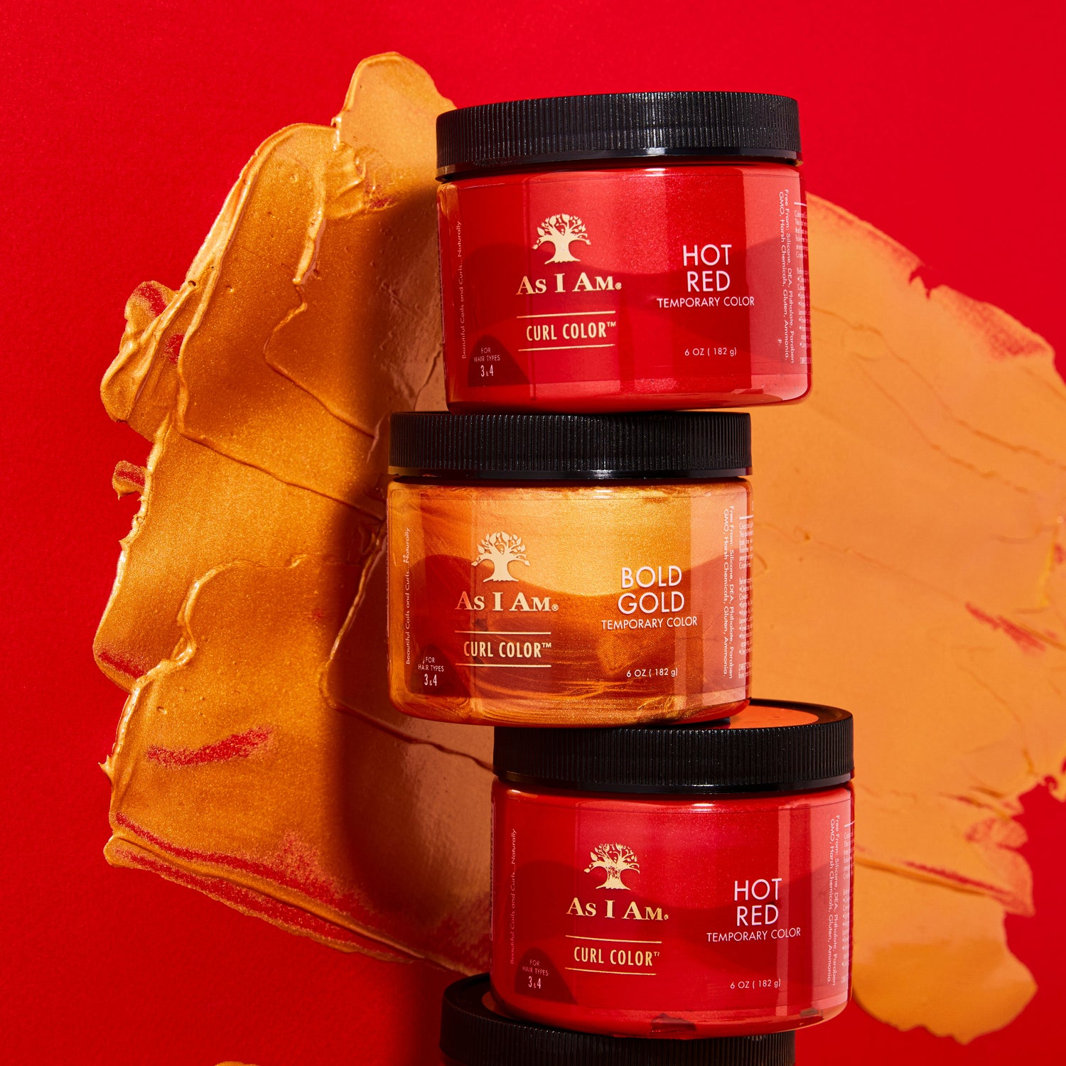 As I Am Curl Color en Hot Red et Bold Gold - deux pots empilés pour présenter des gels de coloration temporaire vibrants qui rehaussent les boucles d'une couleur riche, d'une définition et d'une brillance.