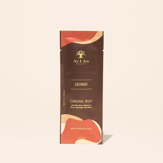 AS I AM Curling Jelly, en sachet de 1 oz, présente une texture claire, semblable à un gel, conçue pour définir les boucles et les spirales, minimiser les frisottis et offrir une tenue durable avec de la brillance et du rebond.