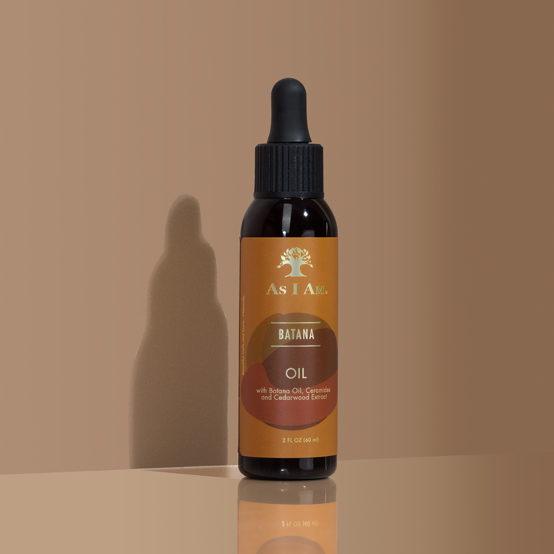 Bouteille d'huile As I Am batana sur fond beige