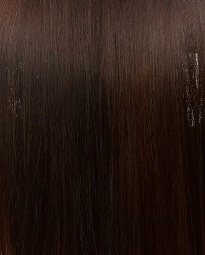 Gros plan sur la texture des cheveux brun foncé